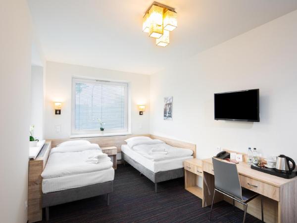 Automobil Hotel : photo 3 de la chambre chambre lits jumeaux