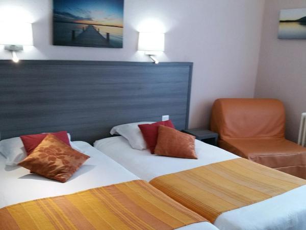 Cit'Hotel Du Port Rhu : photo 1 de la chambre chambre double avec bain & lit d'appoint - vue port rhu