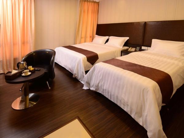 Hotel Nusa CT : photo 2 de la chambre chambre triple supérieure