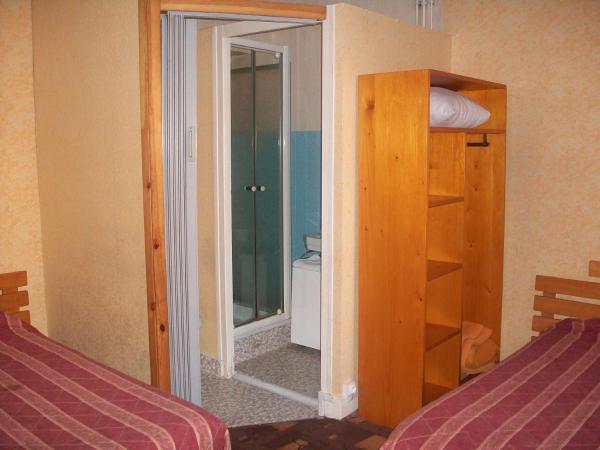 Hotel L'Aiglon : photo 1 de la chambre chambre familiale (2adultes et 2enfants)