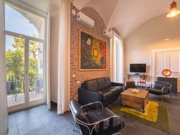 The Bellini House by House In Naples : photo 5 de la chambre suite avec balcon et vue sur le jardin