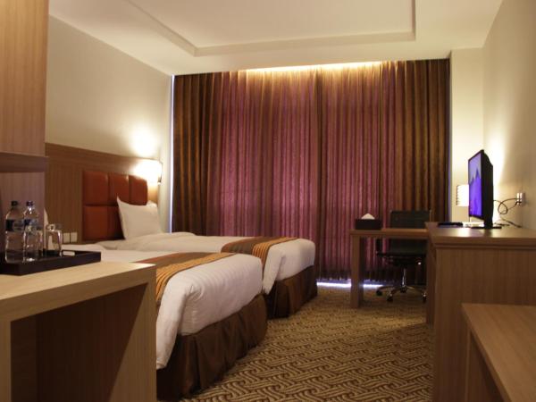 Cavinton Hotel Malioboro Yogyakarta by Tritama Hospitality : photo 2 de la chambre chambre double ou lits jumeaux supérieure