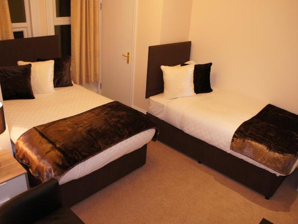 Sapphire Hotel London : photo 1 de la chambre chambre lits jumeaux avec salle de bains privative