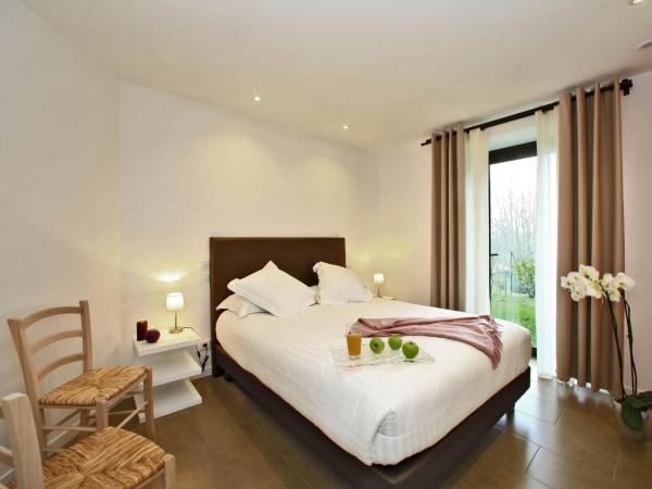 Les Jardins du Porche : photo 4 de la chambre appartement 2 chambres de luxe avec jardin privé