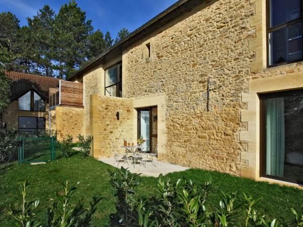 Les Jardins du Porche : photo 7 de la chambre appartement 2 chambres de luxe avec jardin privé