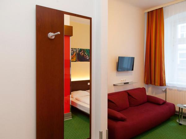 Pension Stadthalle : photo 6 de la chambre chambre double ou lits jumeaux