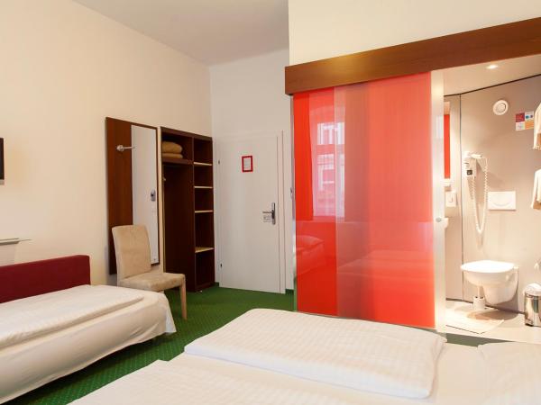 Pension Stadthalle : photo 10 de la chambre chambre double ou lits jumeaux