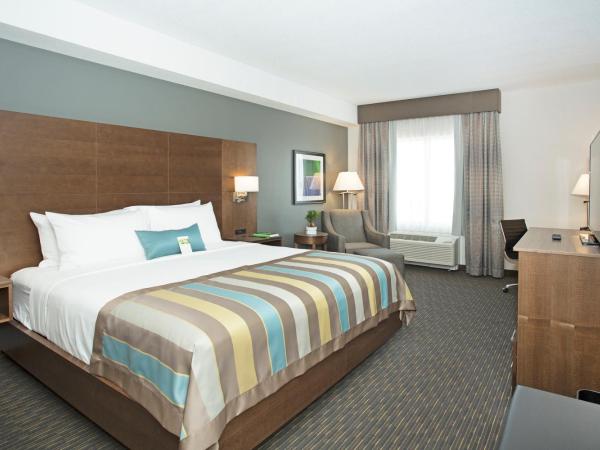 Wingate by Wyndham Calgary Airport : photo 1 de la chambre chambre lit king-size - non-fumeurs