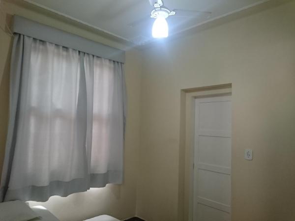 Pousada Acácia da Barra : photo 9 de la chambre twin room with pull out bed and a fan