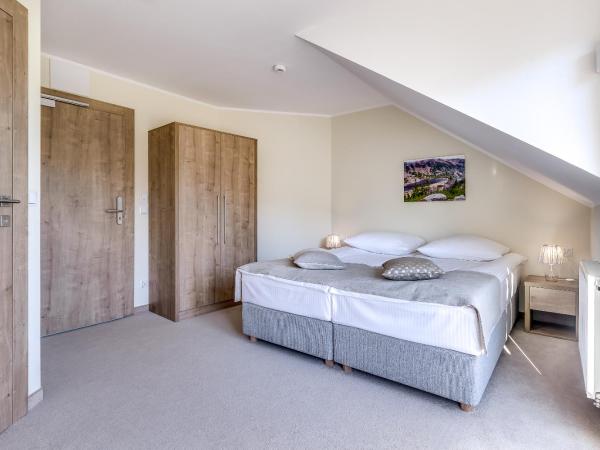 Zamek Księża Góra : photo 3 de la chambre chambre double ou lits jumeaux standard