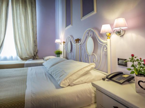 Hotel Ferrucci : photo 10 de la chambre chambre quadruple