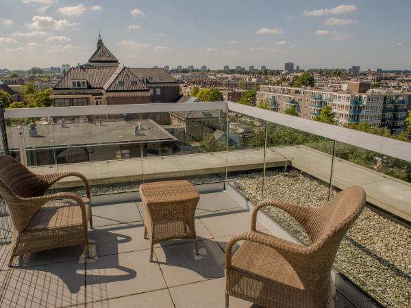 Grand Hotel Downtown : photo 7 de la chambre suite spacieuse de grand standing avec terrasse - vue sur ville