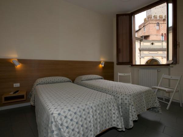 Hotel La Perla : photo 2 de la chambre chambre lits jumeaux