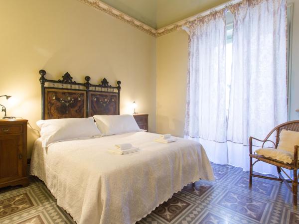 B&B Porta Carolina : photo 2 de la chambre chambre triple supérieure