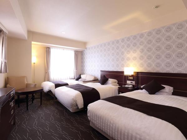 Nishitetsu Grand Hotel : photo 1 de la chambre chambre d'angle triple - non-fumeurs