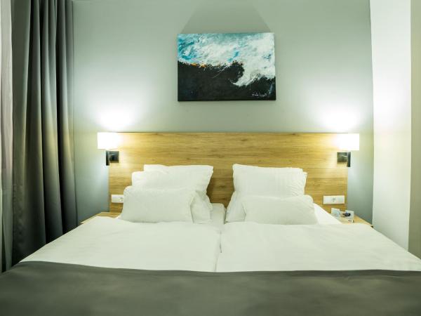 LivInn Hotel : photo 3 de la chambre chambre double ou lits jumeaux