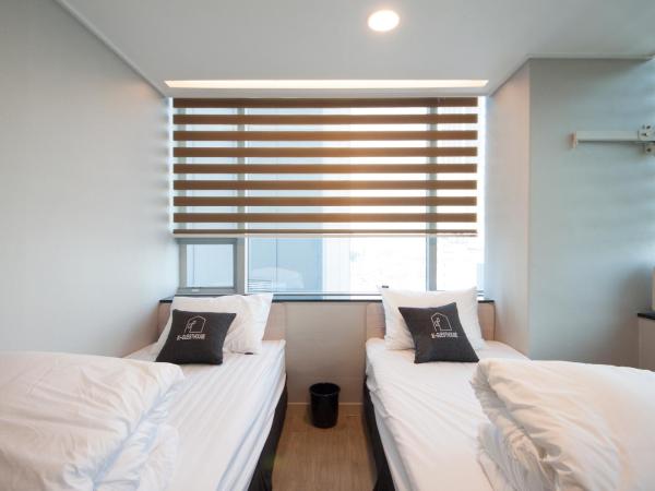 K-Guesthouse Dongdaemun Premium : photo 7 de la chambre chambre lits jumeaux standard