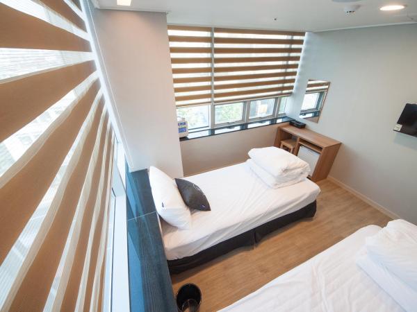 K-Guesthouse Dongdaemun Premium : photo 9 de la chambre chambre lits jumeaux standard
