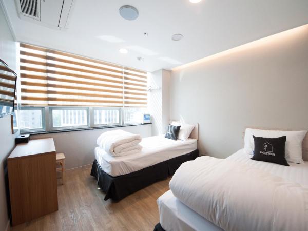 K-Guesthouse Dongdaemun Premium : photo 1 de la chambre chambre triple standard