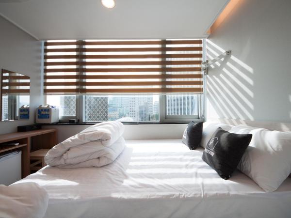 K-Guesthouse Dongdaemun Premium : photo 4 de la chambre chambre triple standard