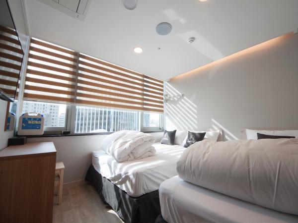 K-Guesthouse Dongdaemun Premium : photo 6 de la chambre chambre triple standard
