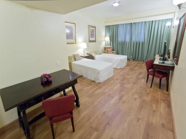 Dayrell Hotel e Centro De Convenções : photo 3 de la chambre chambre lit queen-size deluxe