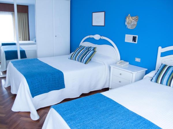 Hostal La Provinciana : photo 2 de la chambre chambre triple