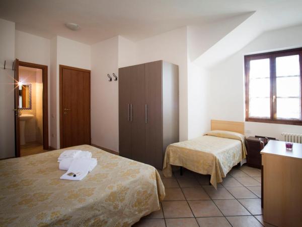 Soggiorno La Primula : photo 3 de la chambre chambre triple