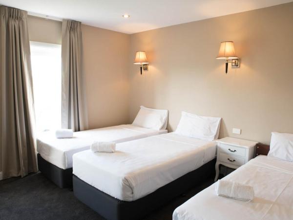 Lily Sands Inn : photo 4 de la chambre chambre triple