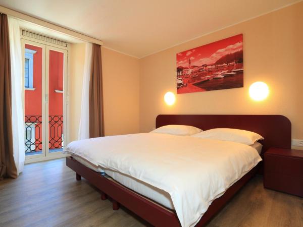 New Elvezia : photo 3 de la chambre chambre lits jumeaux avec balcon - vue latérale sur lac