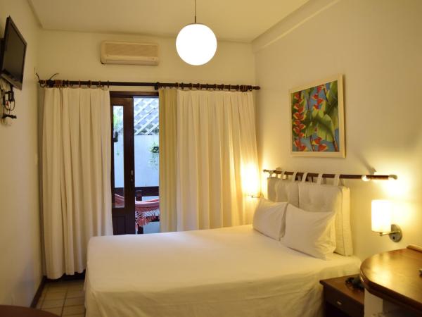 Hotel Pousada Encanto de Itapoan : photo 9 de la chambre chambre double