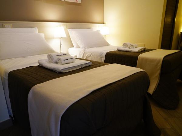 B&B President's Home : photo 6 de la chambre chambre double ou lits jumeaux avec lit d'appoint