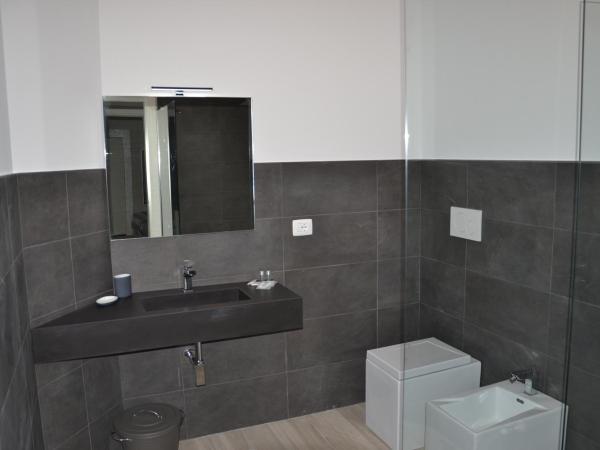 In Centro Glam : photo 6 de la chambre chambre triple