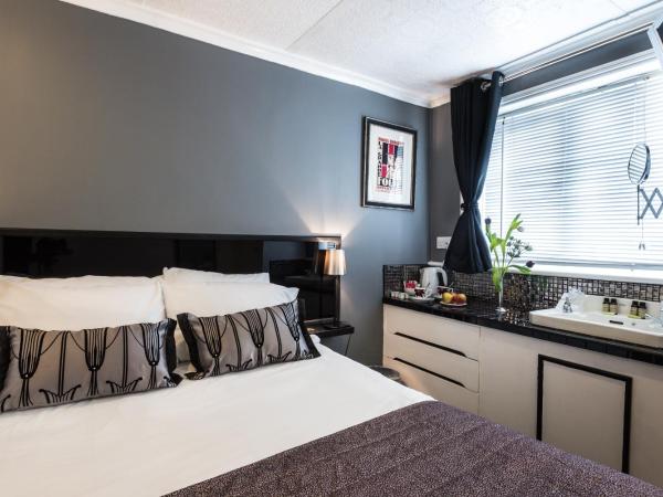 Paskins Town House : photo 1 de la chambre chambre double Économique avec salle de bains commune