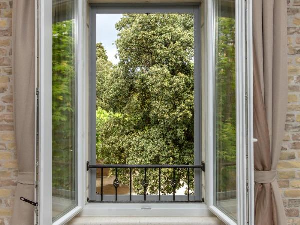 Pellegrini Luxury Rooms : photo 7 de la chambre chambre double ou lits jumeaux deluxe – vue sur jardin