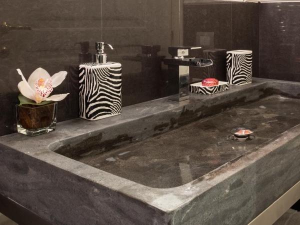 La Maison du Sage : photo 10 de la chambre chambre lit king-size deluxe - vue sur ville