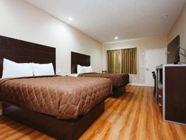 Palace Inn Houston Northwest 290 : photo 9 de la chambre chambre avec 2 grands lits queen-size