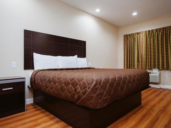 Palace Inn Houston Northwest 290 : photo 2 de la chambre chambre lit king-size - non-fumeurs