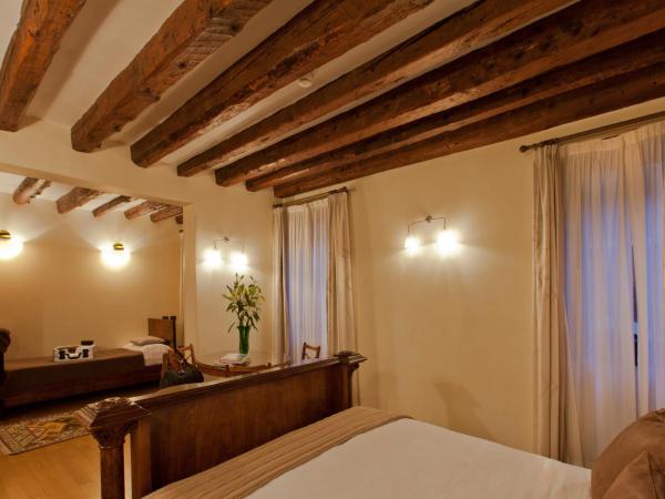 Hotel Saturnia & International : photo 1 de la chambre chambre triple classique