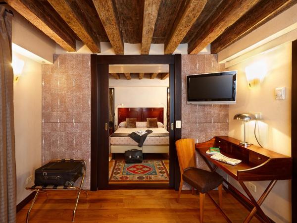 Hotel Saturnia & International : photo 2 de la chambre chambre triple classique