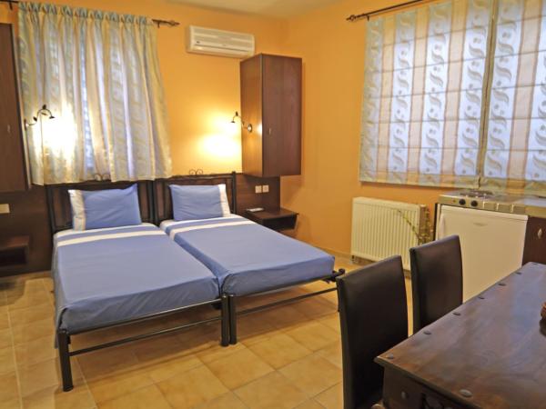 Minos Pension : photo 1 de la chambre chambre lits jumeaux