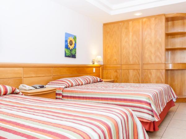 Hotel Atlântico Búzios Convention : photo 2 de la chambre chambre quadruple standard