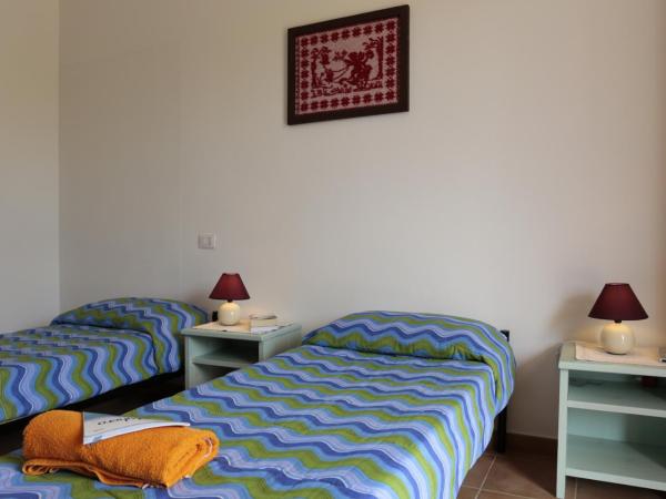 Bed and breakfast Le Camelie : photo 3 de la chambre grande chambre simple 