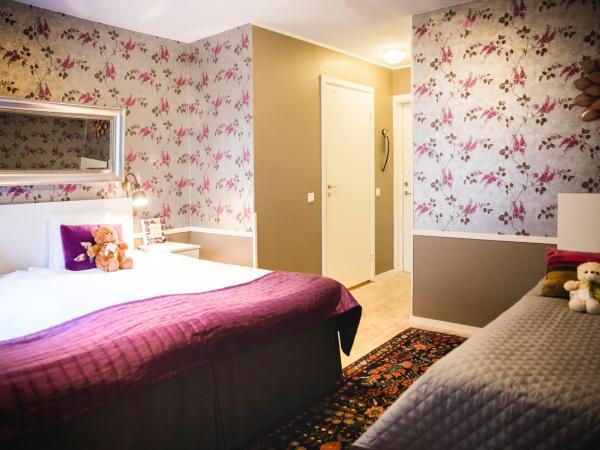 Lilla Rådmannen : photo 6 de la chambre chambre triple