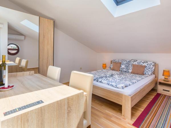 Bed & breakfast La Fontana Medulin : photo 8 de la chambre chambre familiale