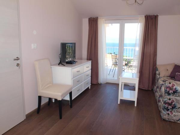 Guesthouse Olei : photo 8 de la chambre suite lit king-size - vue sur mer
