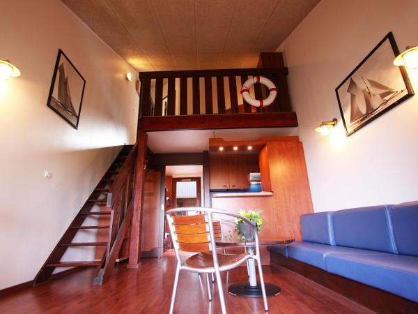 Residence Castell'Verde : photo 1 de la chambre appartement (2 adultes + 2 enfants ) (s)