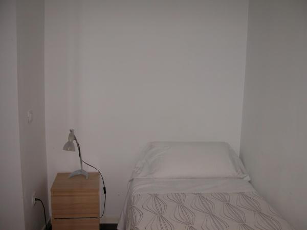 Hostal Goyal Pizarro : photo 1 de la chambre chambre simple avec salle de bains commune