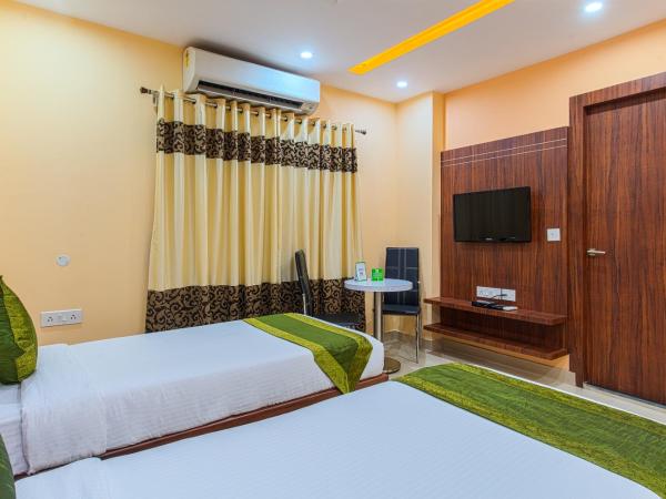 Treebo Globe International : photo 7 de la chambre chambre double ou lits jumeaux standard