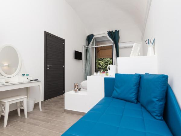 Etna Suite Group : photo 5 de la chambre chambre triple - vue sur jardin